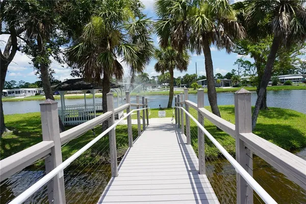 a view of swimming pool from a balcony