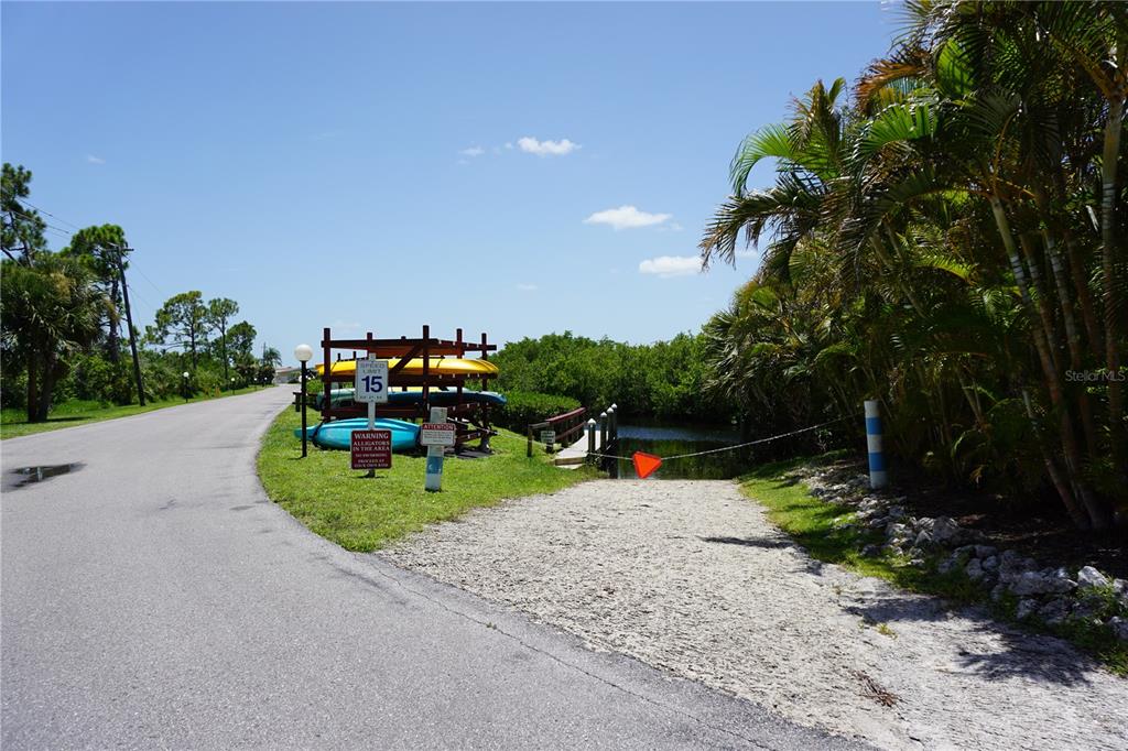 145 Rarotonga Road North Port, FL 34287 - Photo 61 of 64 a view of a park with large trees
