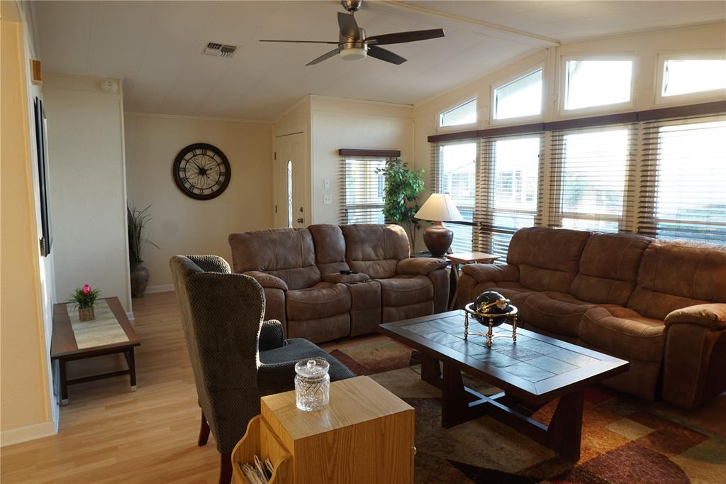 145 Rarotonga Road North Port, FL 34287 - Photo 10 of 64 a living room with furniture and a window