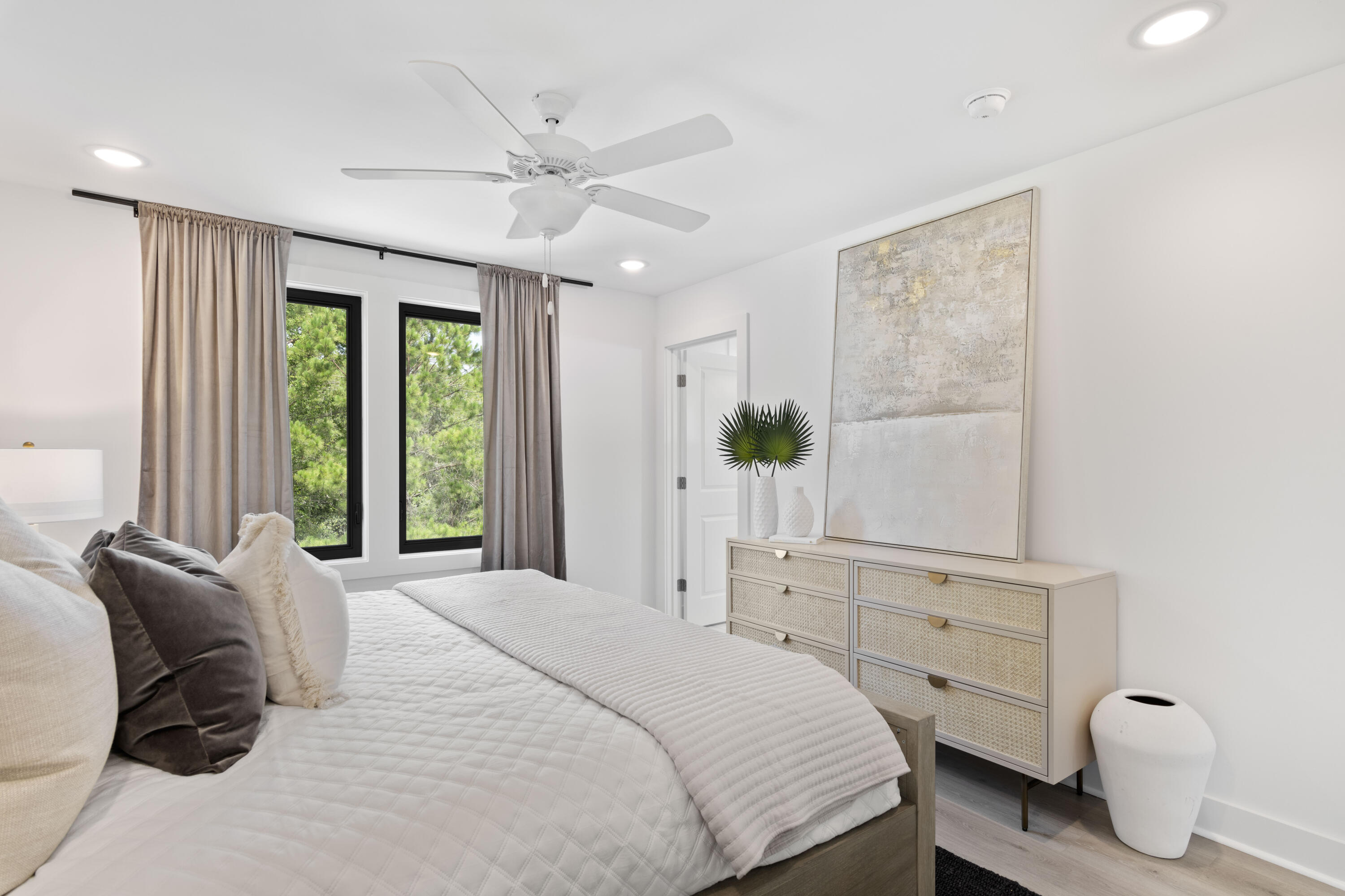 50 Blue Eden Loop, Unit LOT 39 Santa Rosa Beach, FL 32459 - Photo 15 of 29 a bedroom with a bed and a window