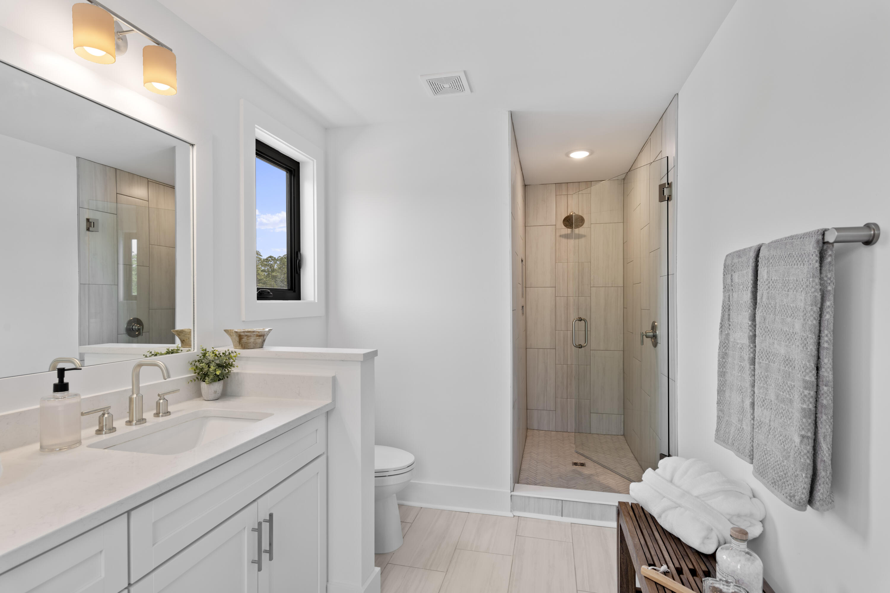 50 Blue Eden Loop, Unit LOT 39 Santa Rosa Beach, FL 32459 - Photo 18 of 29 a bathroom with a double vanity sink toilet and shower