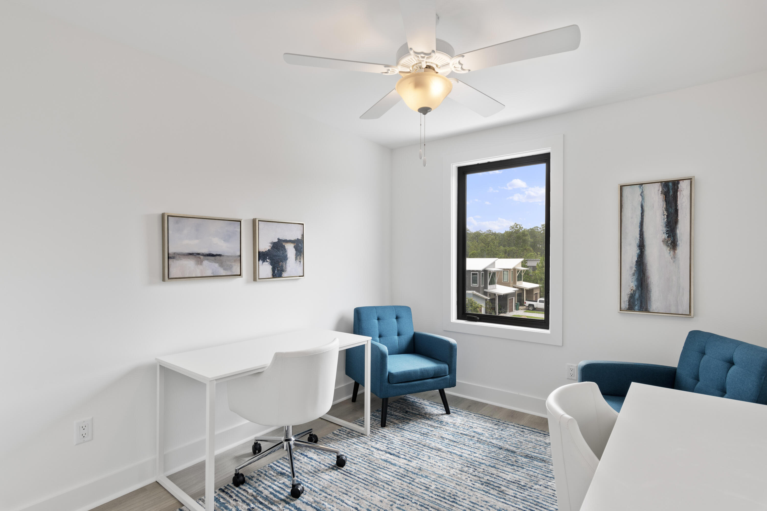 50 Blue Eden Loop, Unit LOT 39 Santa Rosa Beach, FL 32459 - Photo 19 of 29 a living room with furniture and a window