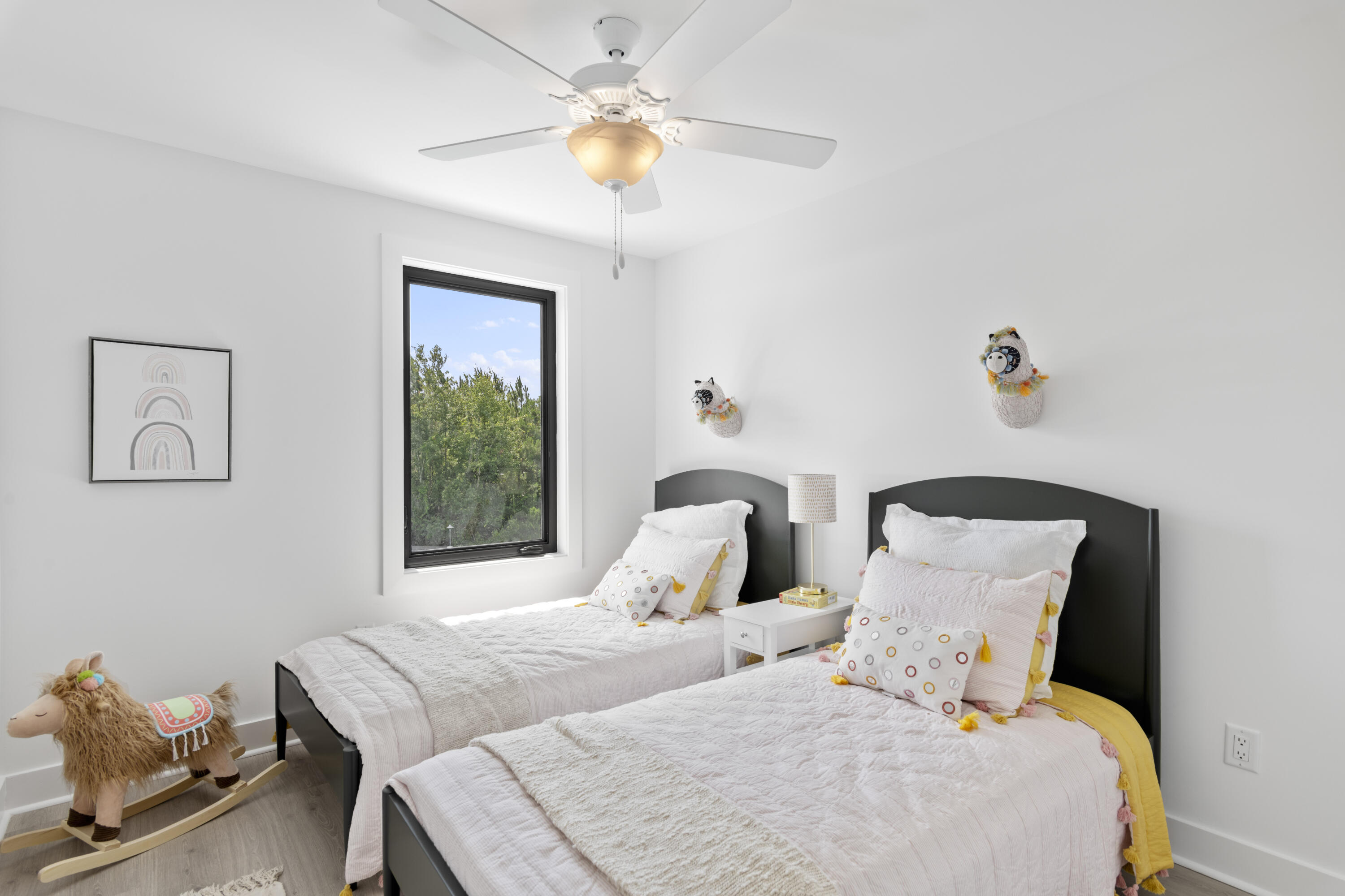 50 Blue Eden Loop, Unit LOT 39 Santa Rosa Beach, FL 32459 - Photo 23 of 29 a bedroom with a bed and a window