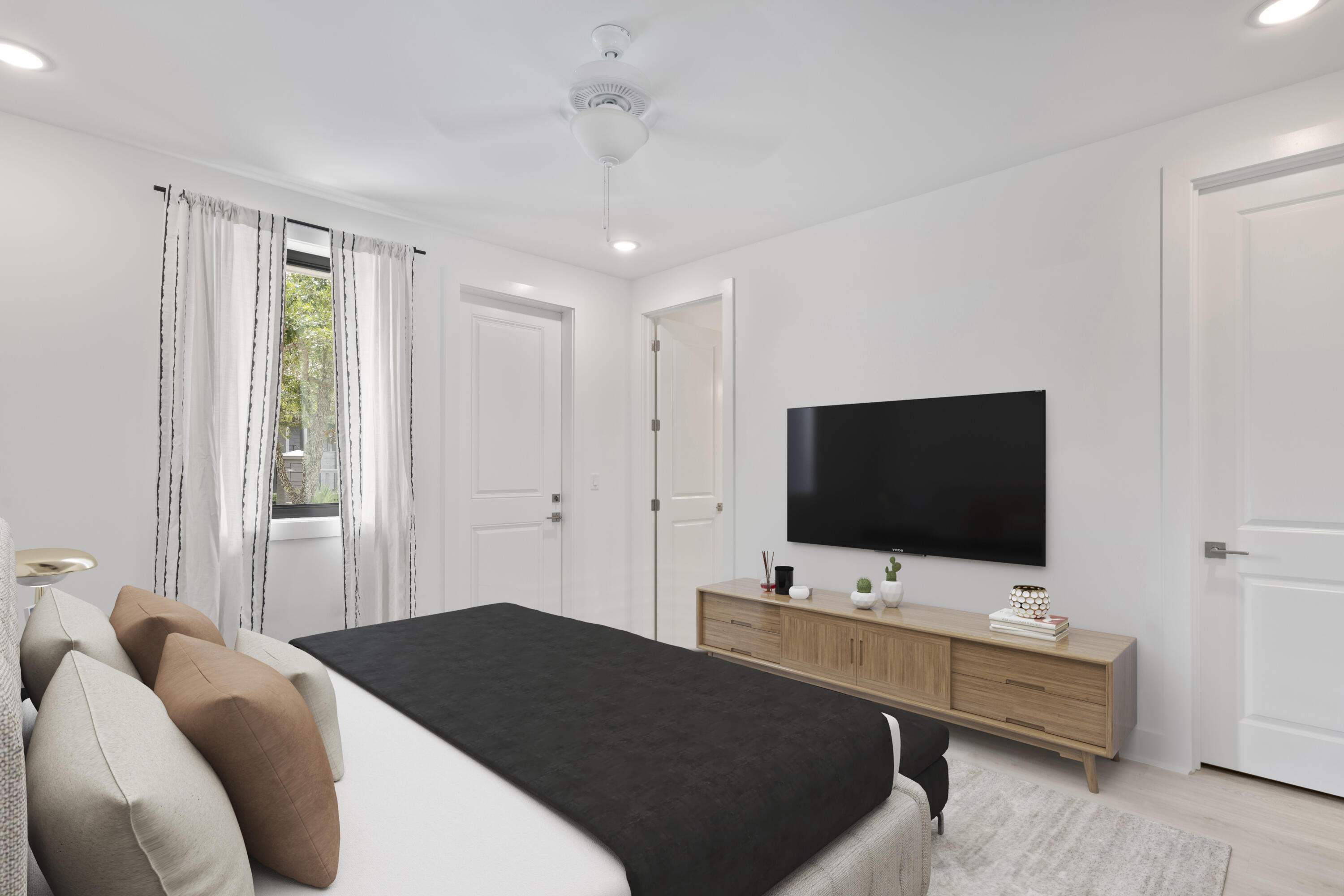 50 Blue Eden Loop, Unit LOT 39 Santa Rosa Beach, FL 32459 - Photo 28 of 29 a bedroom with bed and tv