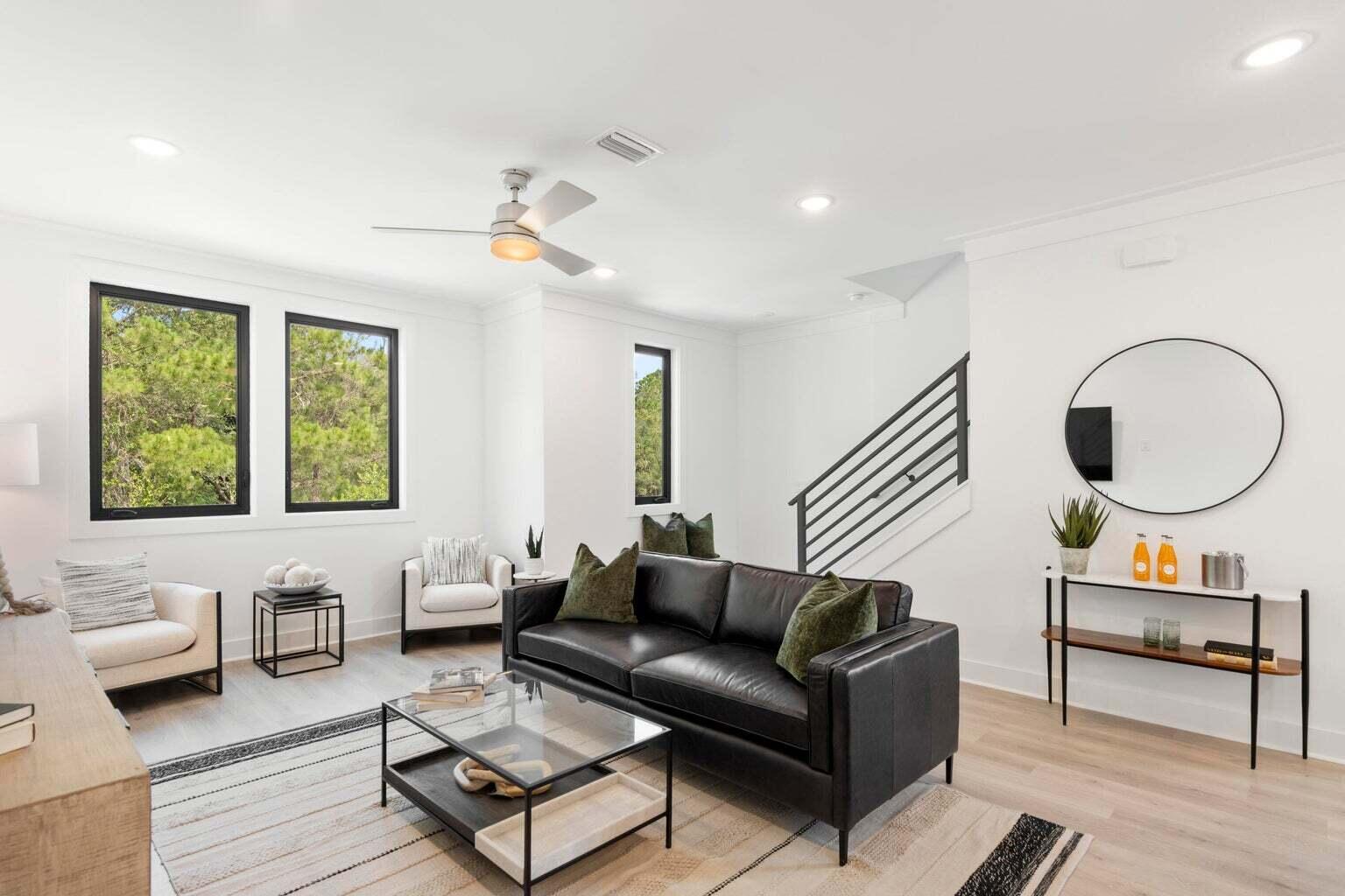 50 Blue Eden Loop, Unit LOT 39 Santa Rosa Beach, FL 32459 - Photo 7 of 29 a living room with furniture and a large window