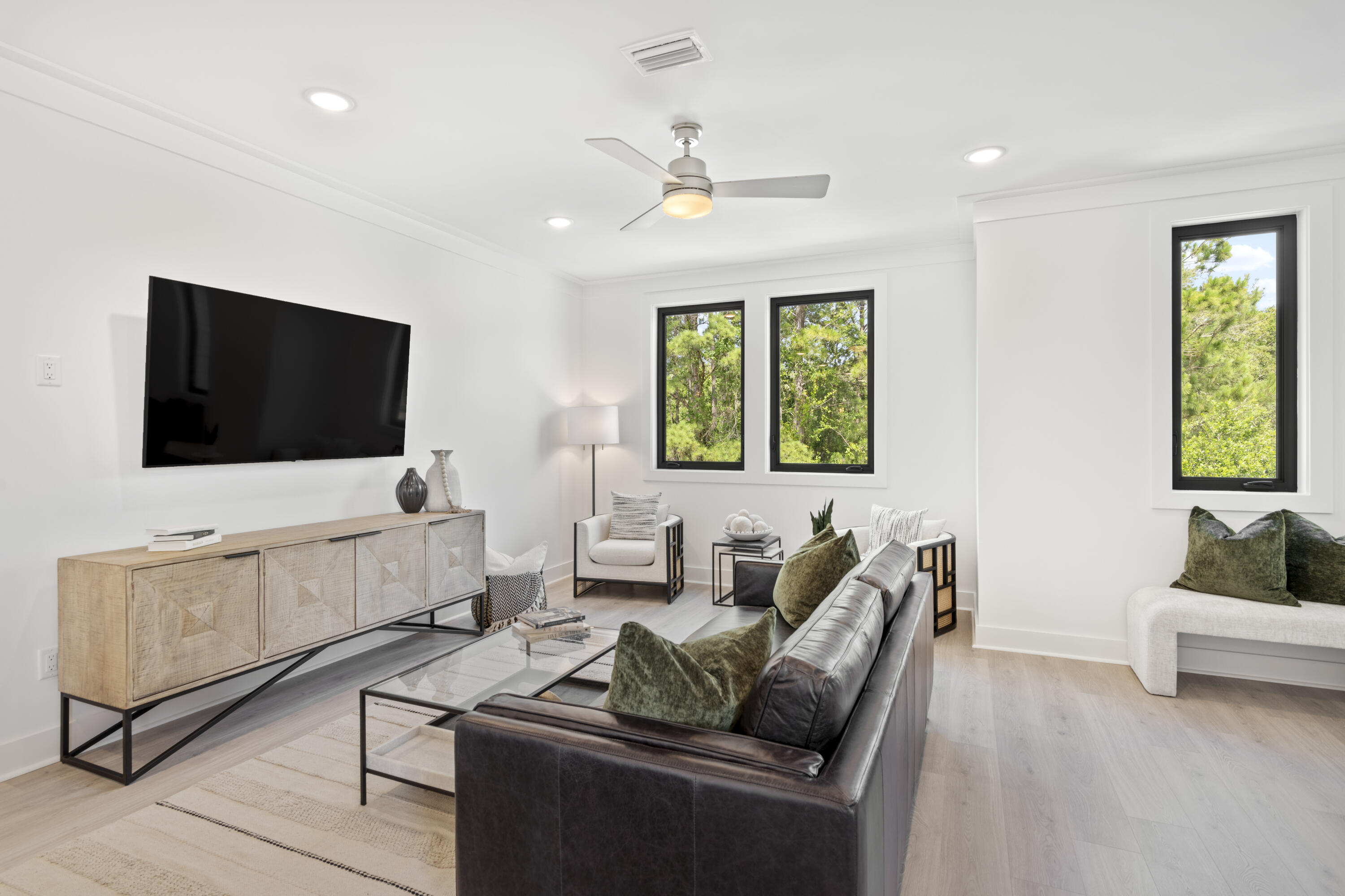 50 Blue Eden Loop, Unit LOT 39 Santa Rosa Beach, FL 32459 - Photo 8 of 29 a living room with furniture and a flat screen tv