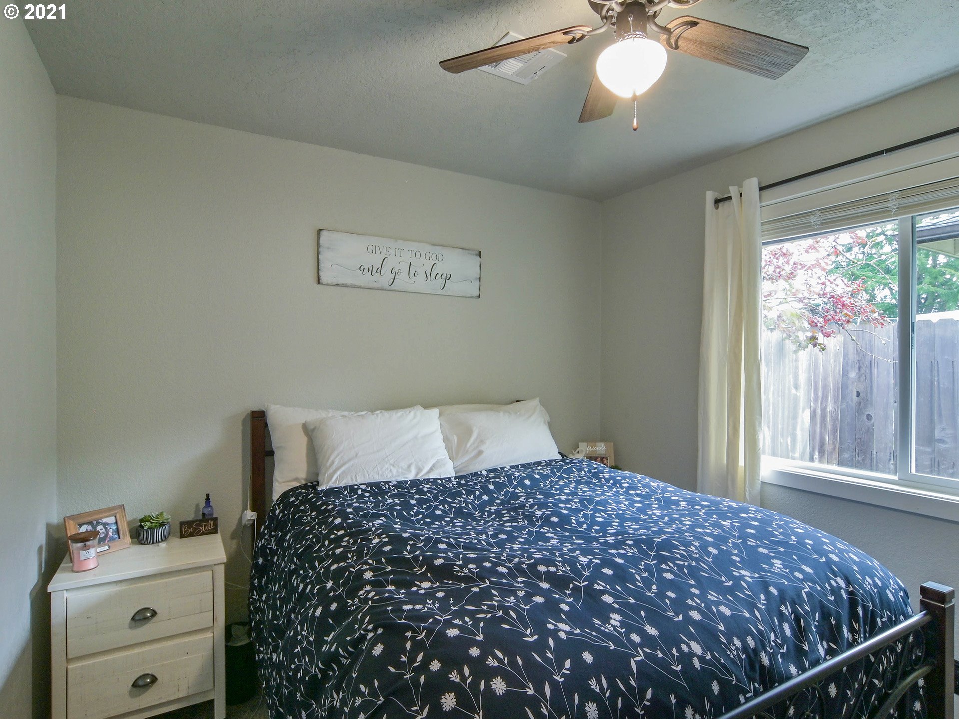 7120 B Street Springfield, OR 97478 - Photo 20 of 32 a bedroom with a bed and a window