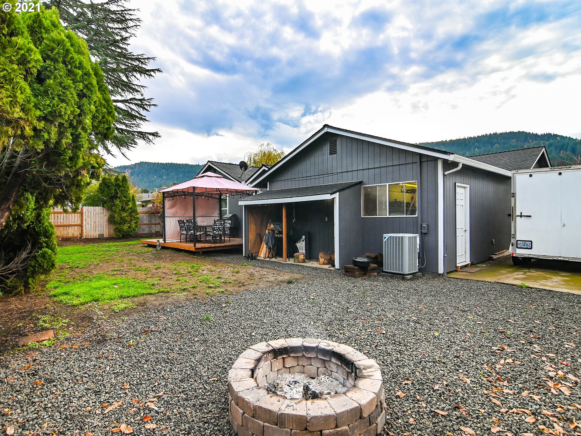 7120 B Street Springfield, OR 97478 - Photo 32 of 32 a view of a house with a backyard
