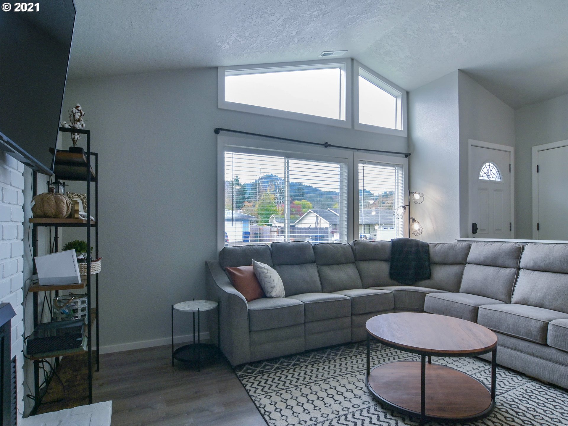 7120 B Street Springfield, OR 97478 - Photo 7 of 32 a living room with furniture and a large window