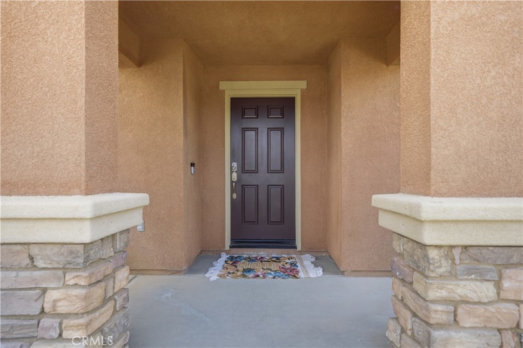3439 Joshua Tree Court Perris, CA 92570 - Photo 13 of 49 a bathroom with a toilet and a shower