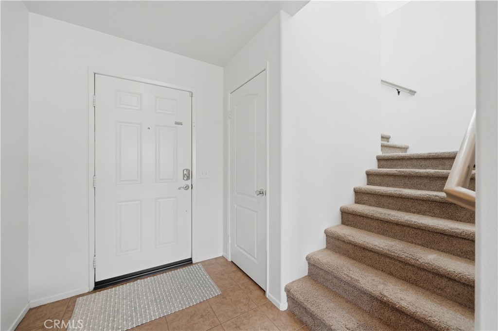 3439 Joshua Tree Court Perris, CA 92570 - Photo 15 of 49 a view of an entryway with staircase
