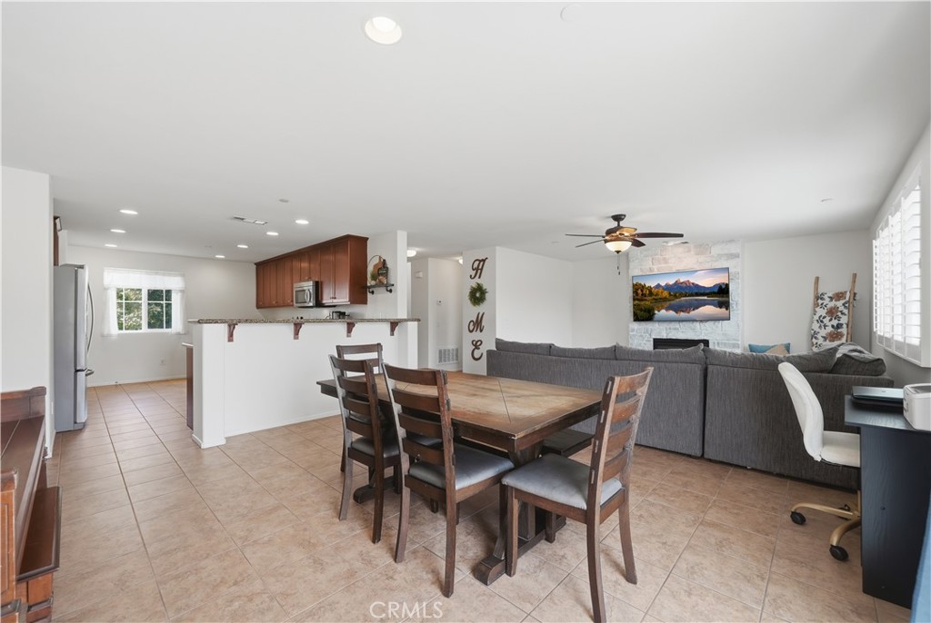 3439 Joshua Tree Court Perris, CA 92570 - Photo 21 of 49 a view of a dining room with furniture