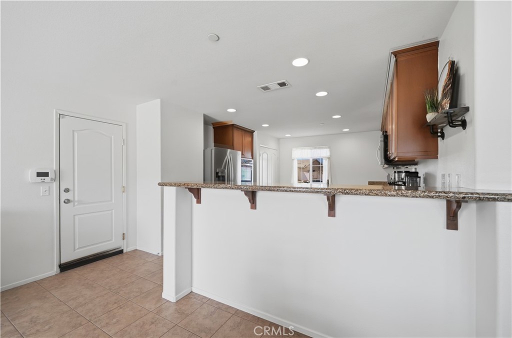 3439 Joshua Tree Court Perris, CA 92570 - Photo 24 of 49 a view of a kitchen with a sink