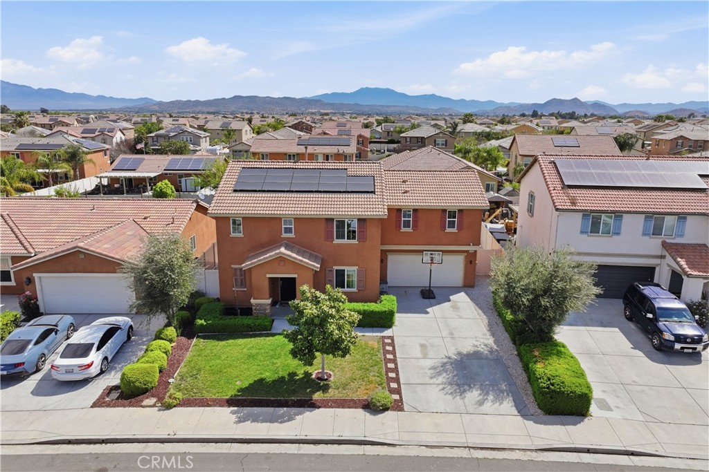 3439 Joshua Tree Court Perris, CA 92570 - Photo 3 of 49 an aerial view of multiple houses