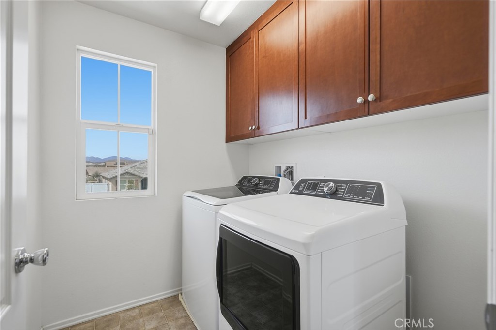 3439 Joshua Tree Court Perris, CA 92570 - Photo 40 of 49 a utility room with dryer and washer