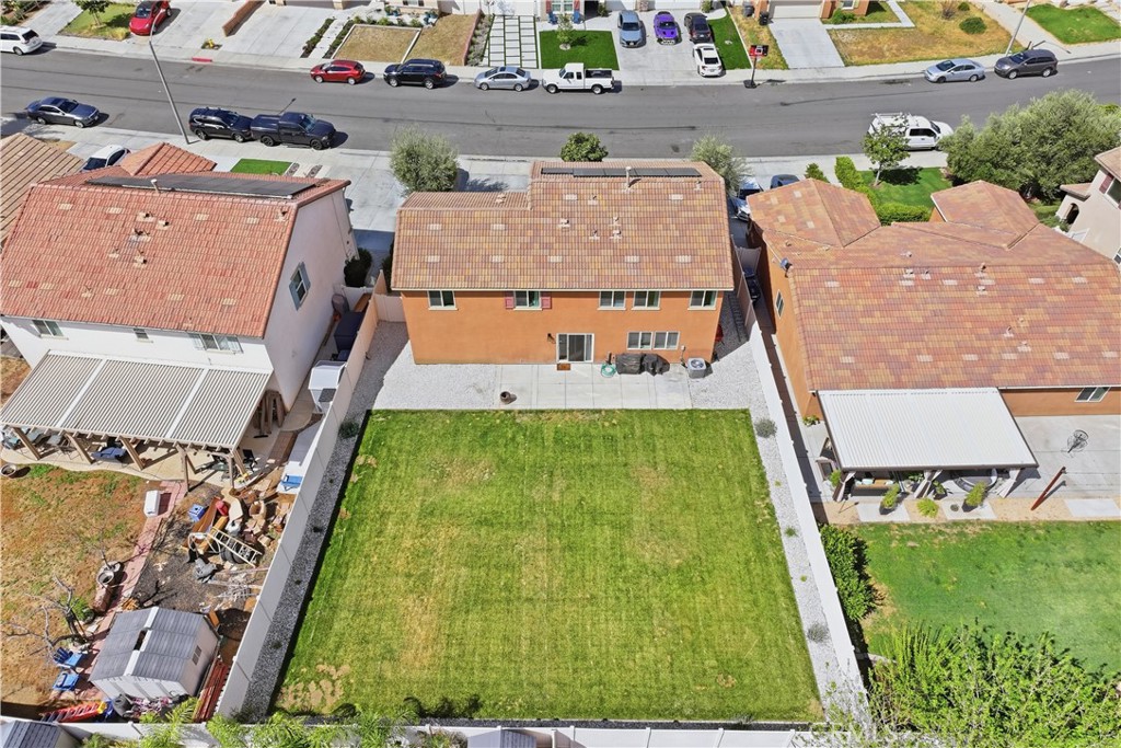 3439 Joshua Tree Court Perris, CA 92570 - Photo 6 of 49 an aerial view of a house with swimming pool