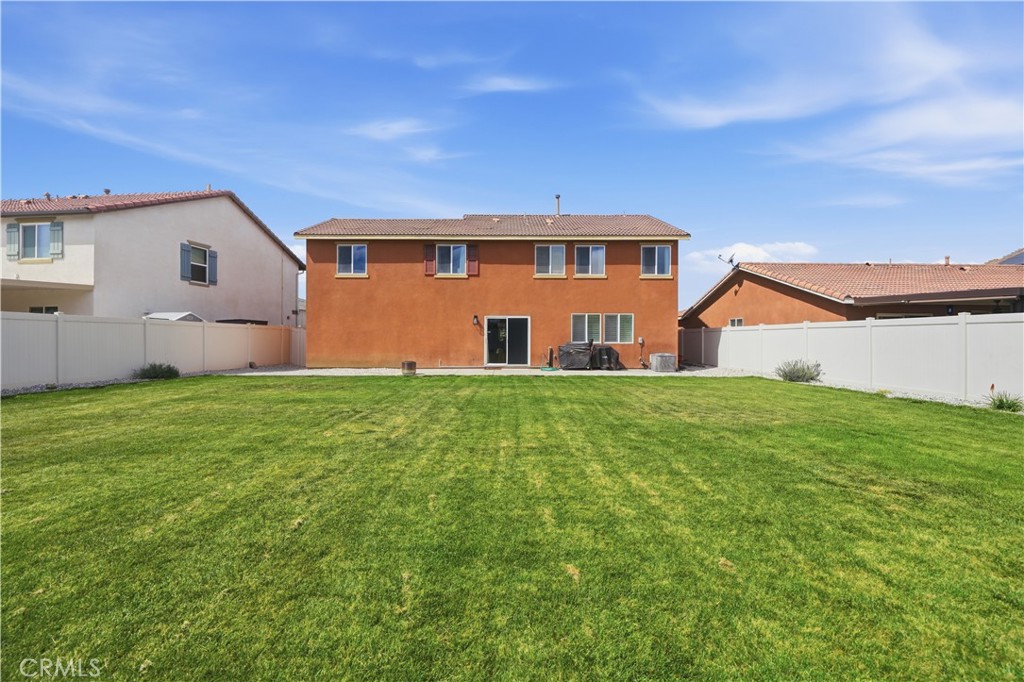 3439 Joshua Tree Court Perris, CA 92570 - Photo 10 of 49 a front view of house with yard and green space