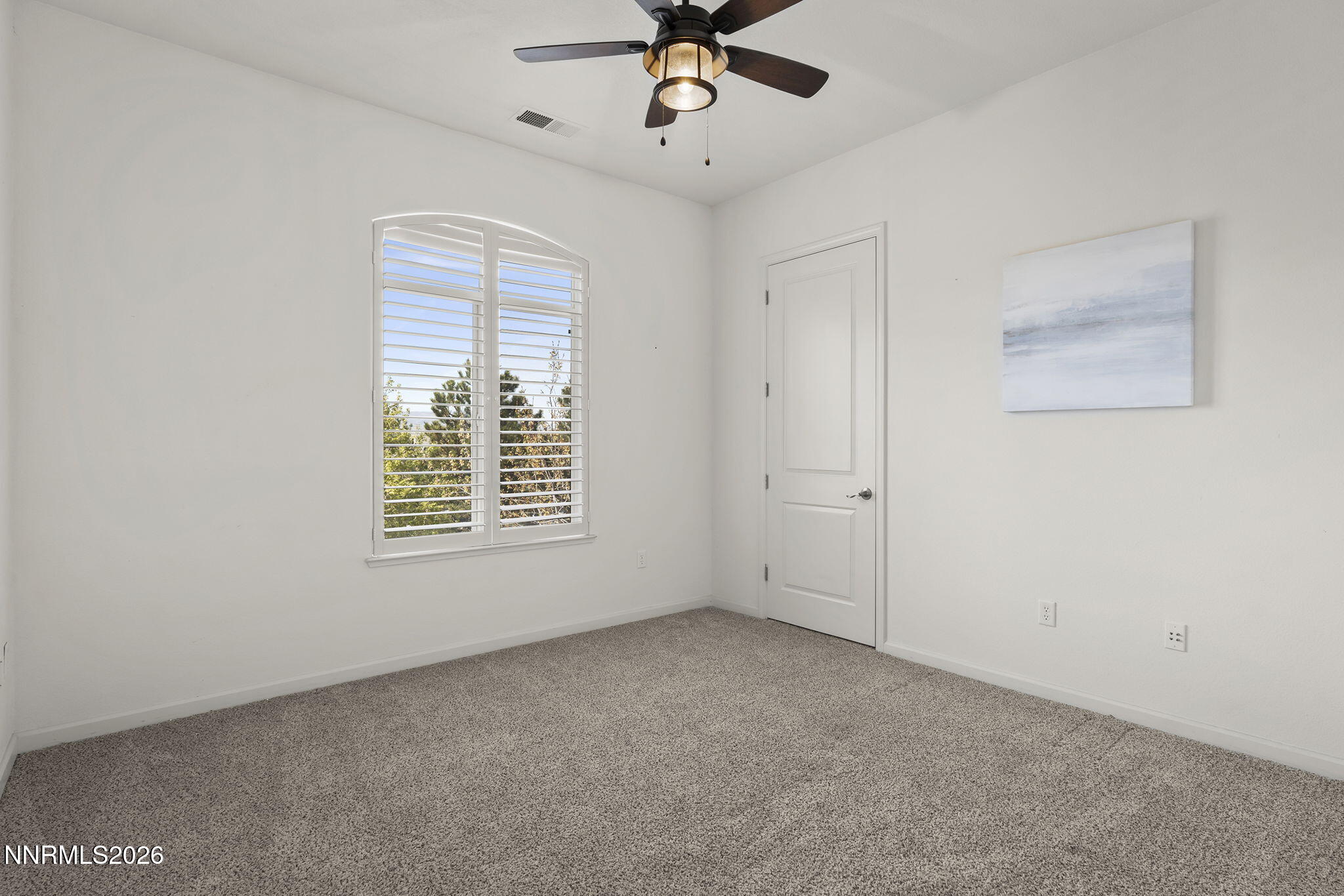 9900 Wilbur May Parkway, Unit 304 Reno, NV 89521 - Photo 23 of 47 a view of an empty room with a window