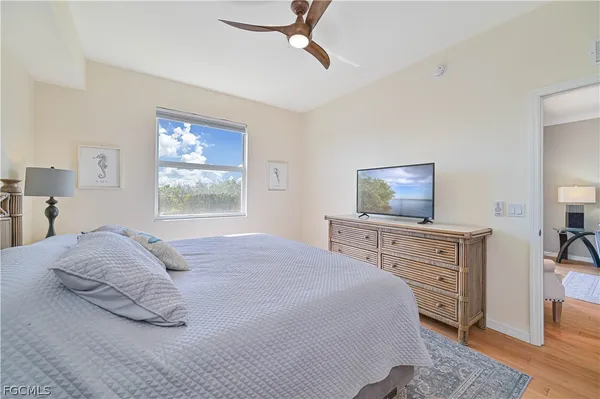 a bedroom with a bed and a dresser