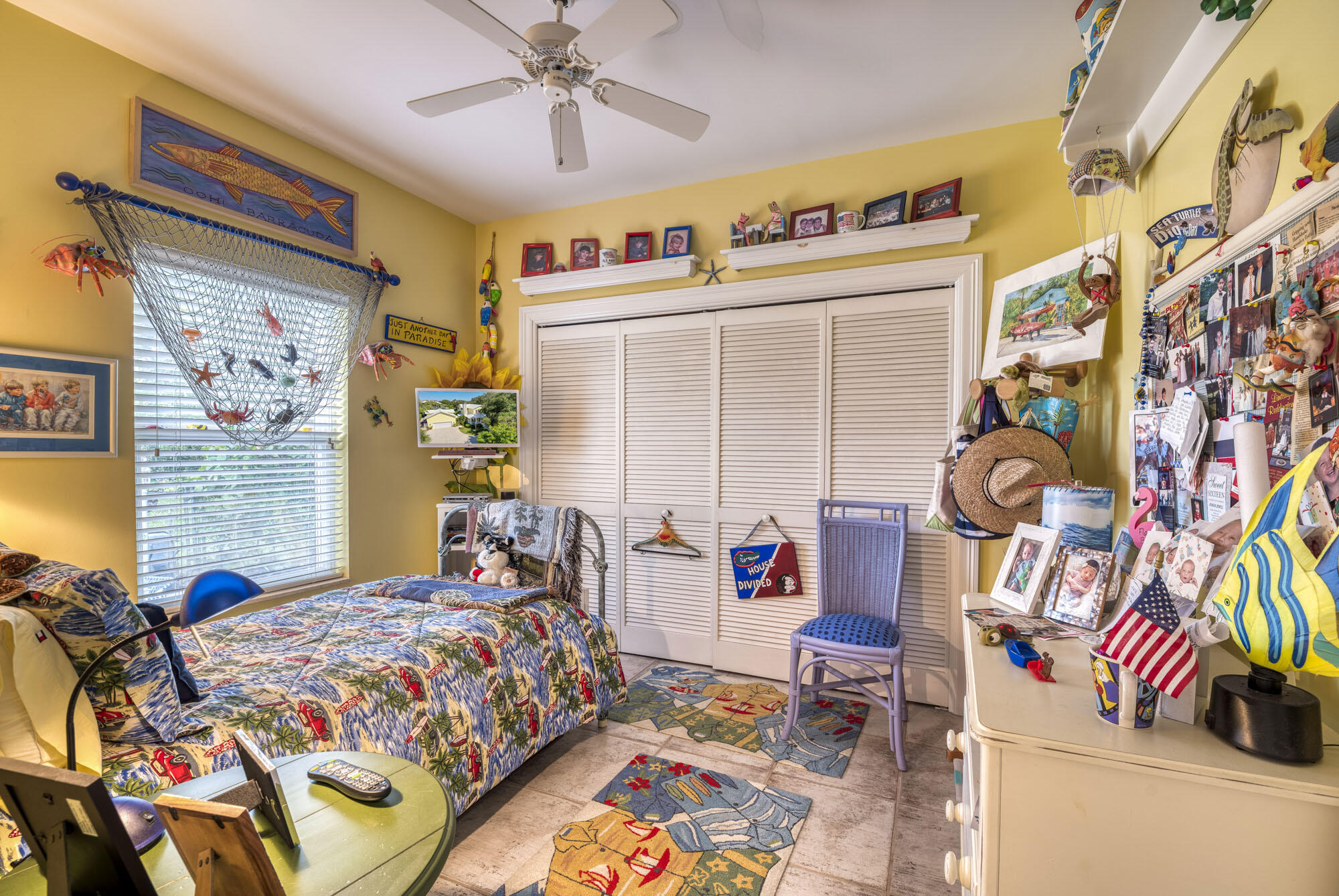 2267 Windsor Road Palm Beach Gardens, FL 33410 - Photo 23 of 45 a bedroom with bed and a window