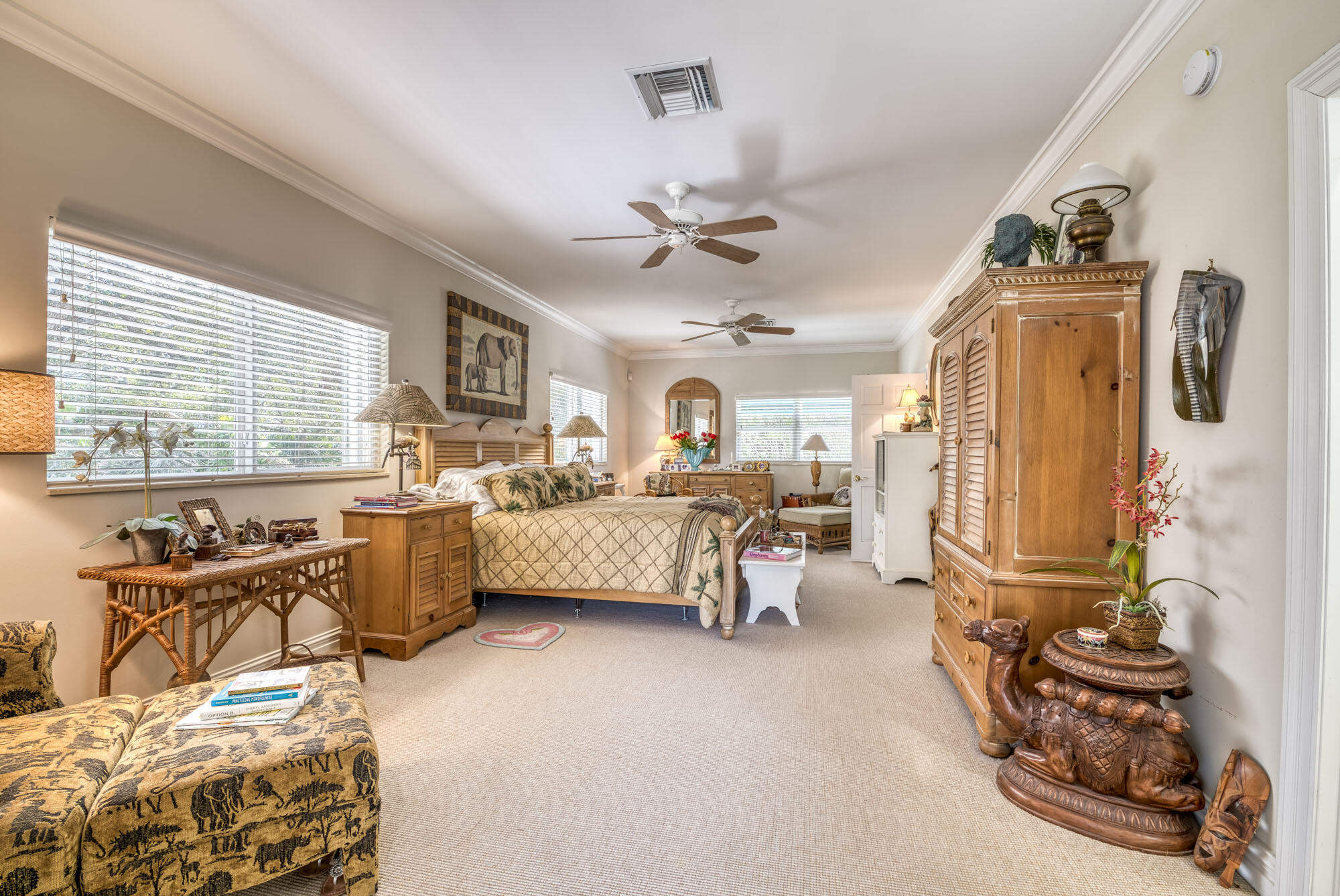 2267 Windsor Road Palm Beach Gardens, FL 33410 - Photo 27 of 45 a bedroom with furniture and a large window