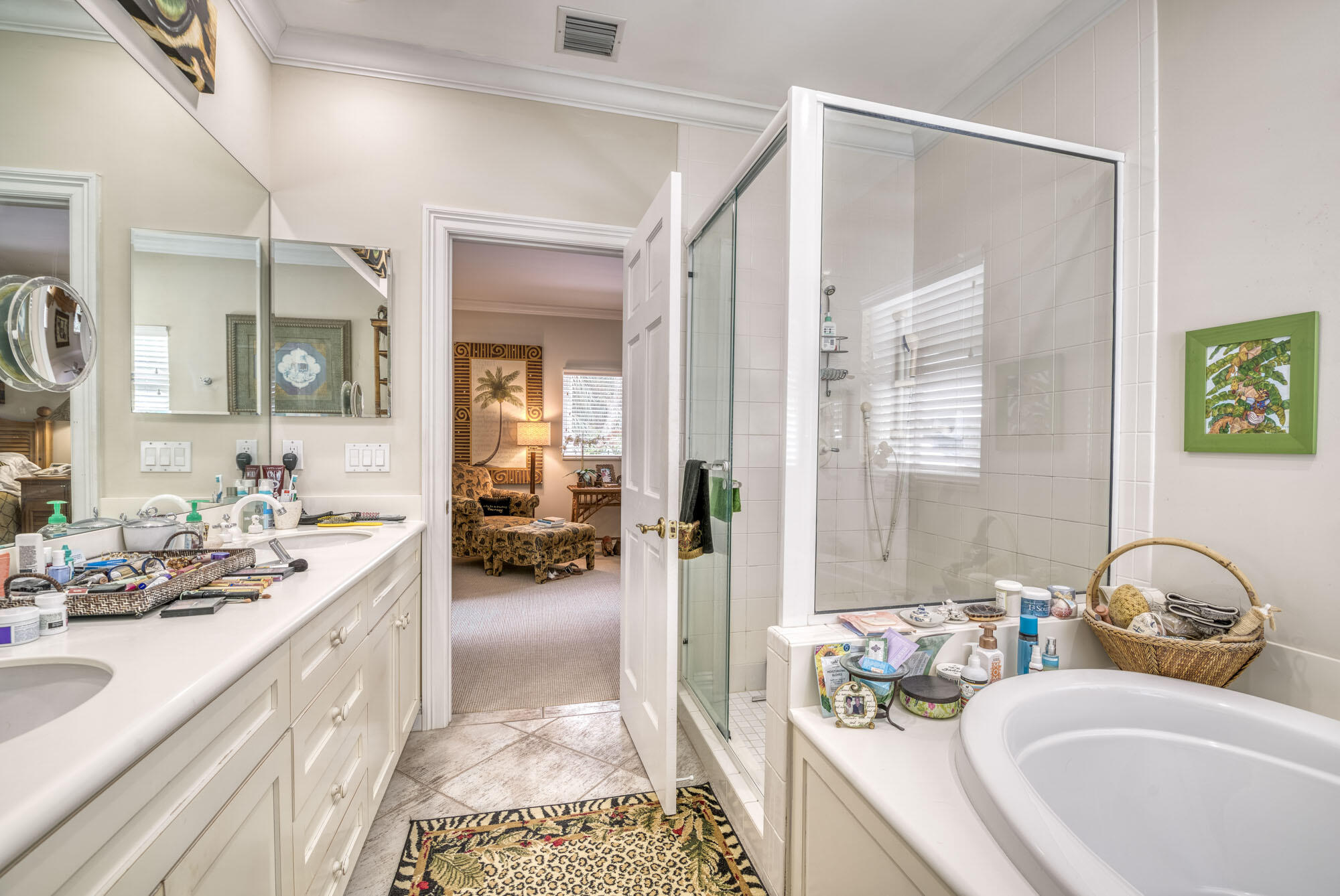 2267 Windsor Road Palm Beach Gardens, FL 33410 - Photo 31 of 45 a bathroom with a tub sink and mirror