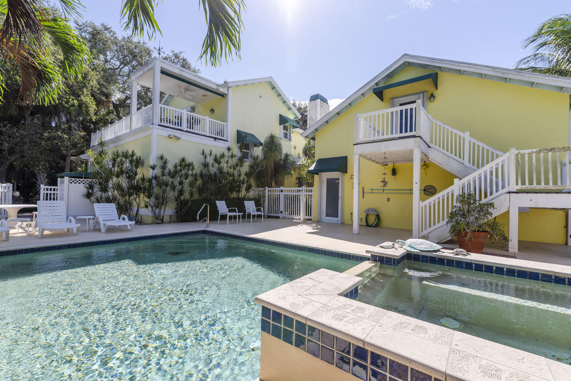 2267 Windsor Road Palm Beach Gardens, FL 33410 - Photo 32 of 45 a view of a house with swimming pool