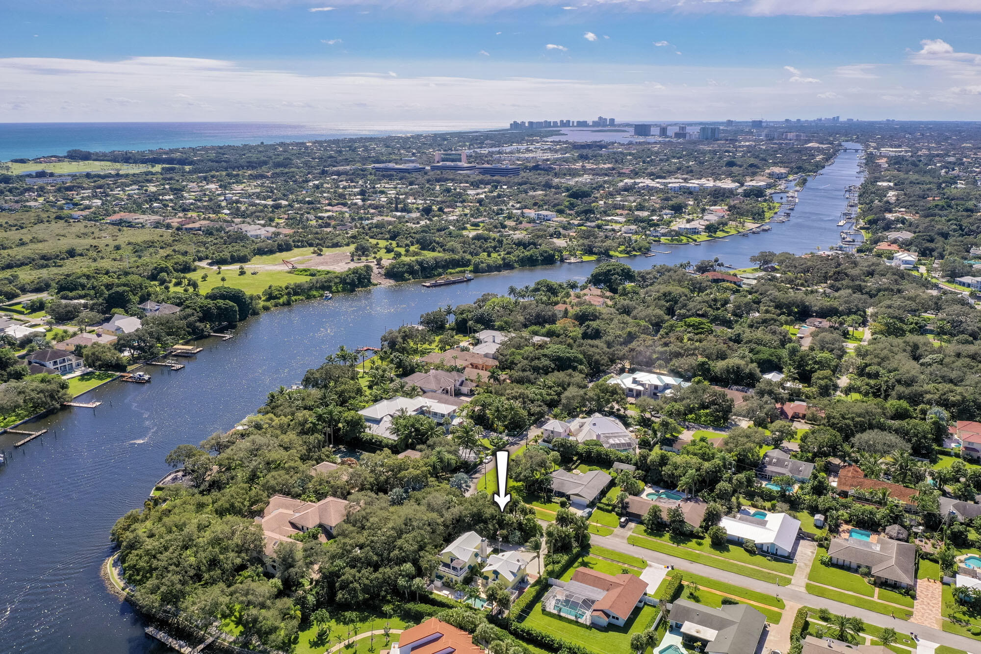2267 Windsor Road Palm Beach Gardens, FL 33410 - Photo 43 of 45 an aerial view of a city with lots of residential buildings