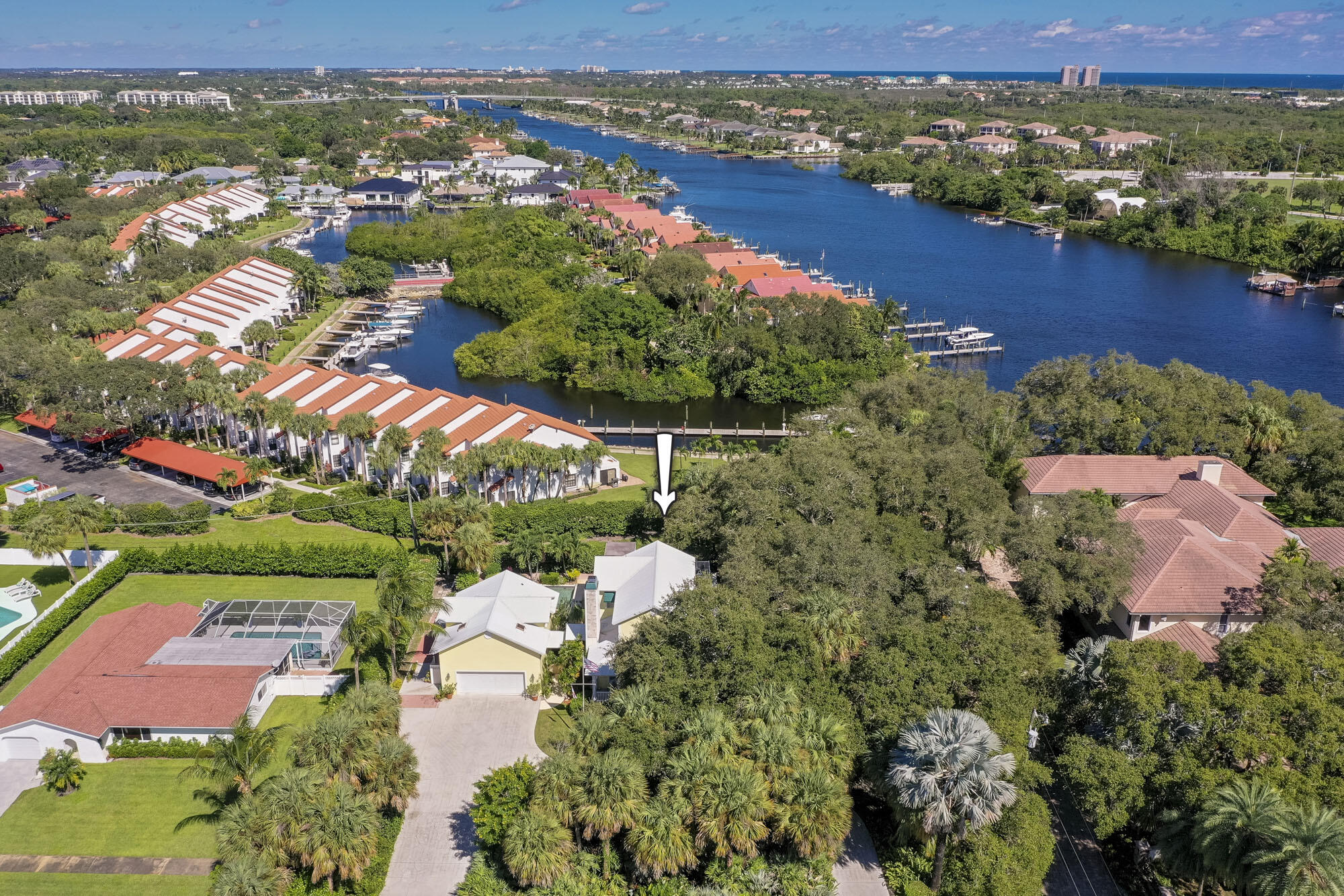 2267 Windsor Road Palm Beach Gardens, FL 33410 - Photo 45 of 45 an aerial view of lake and residential houses with outdoor space