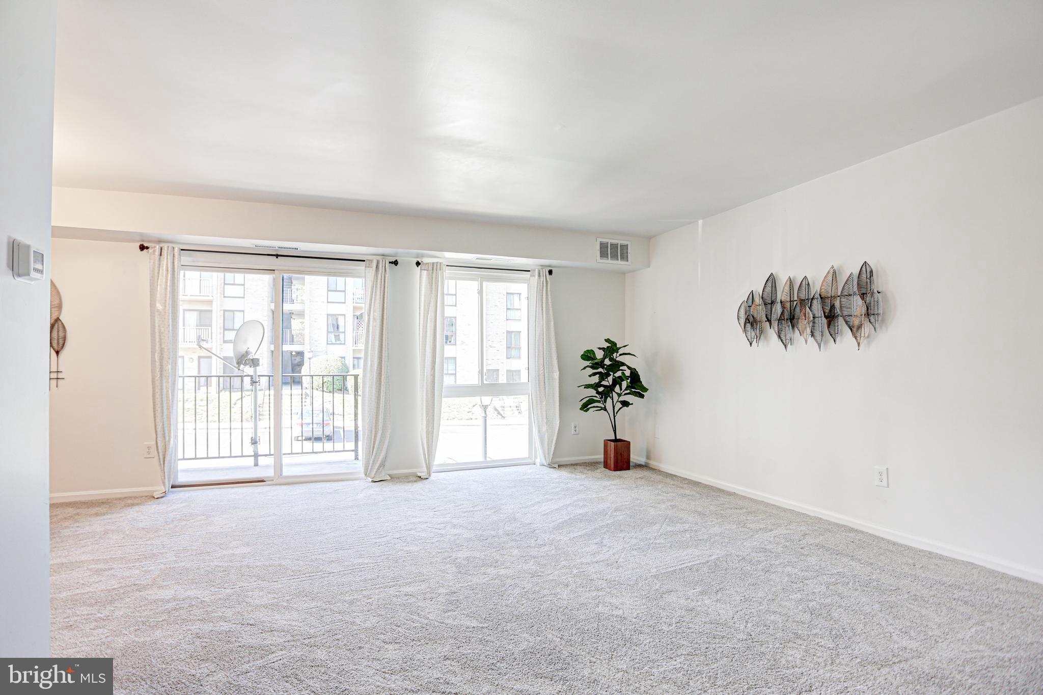 6143 Edsall Road, Unit K Alexandria, VA 22304 - Photo 6 of 24 Floor-to-ceiling windows