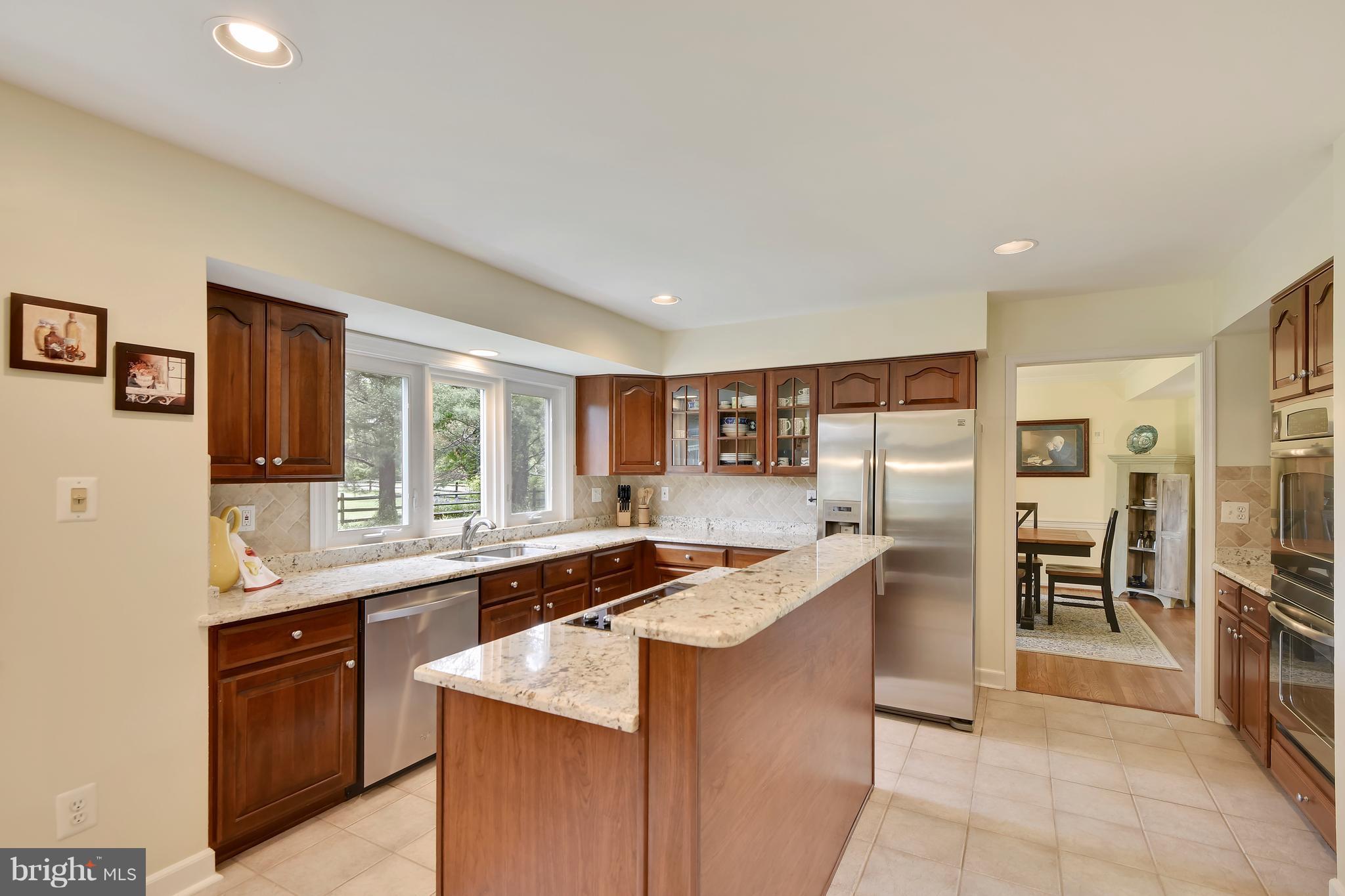 1478 Sharps Point Road Annapolis, MD 21409 - Photo 11 of 30 Kitchen with cook top in island