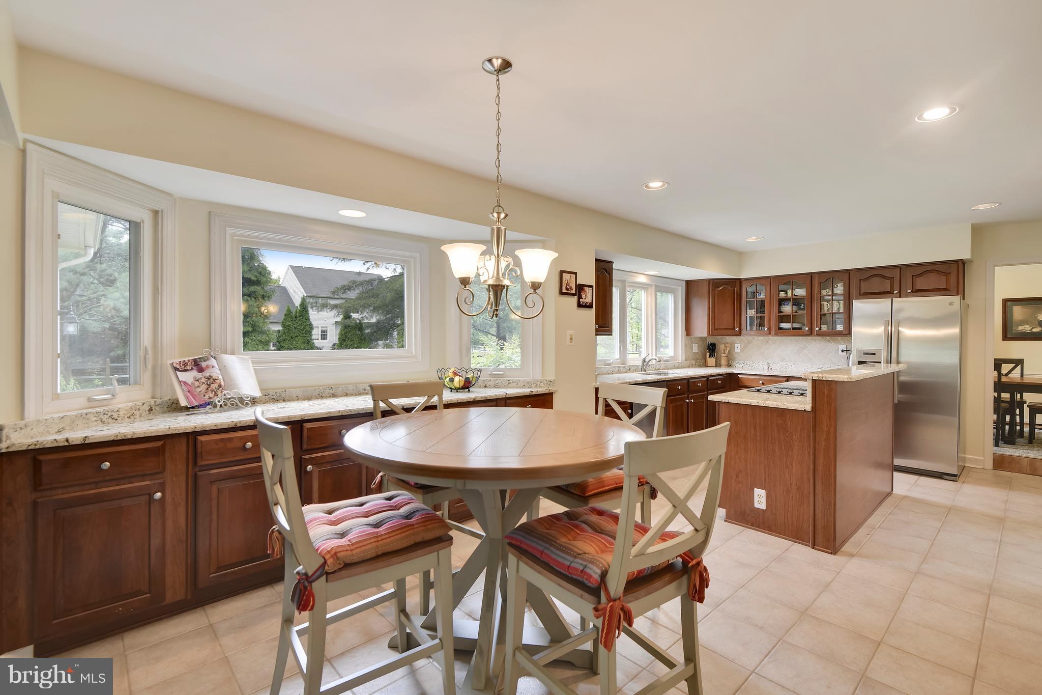 1478 Sharps Point Road Annapolis, MD 21409 - Photo 12 of 30 Eat in Kitchen has granite and stainless steel