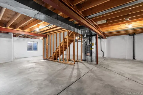 a view of an empty room with stairs