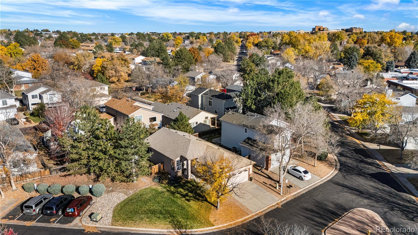 12799 East Wyoming Circle Aurora, CO 80012 - Photo 40 of 44 an aerial view of a house with a yard