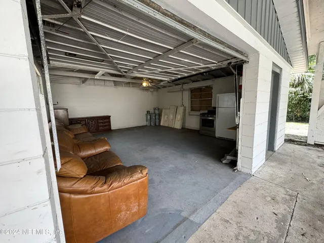 a view of livingroom with furniture and storage