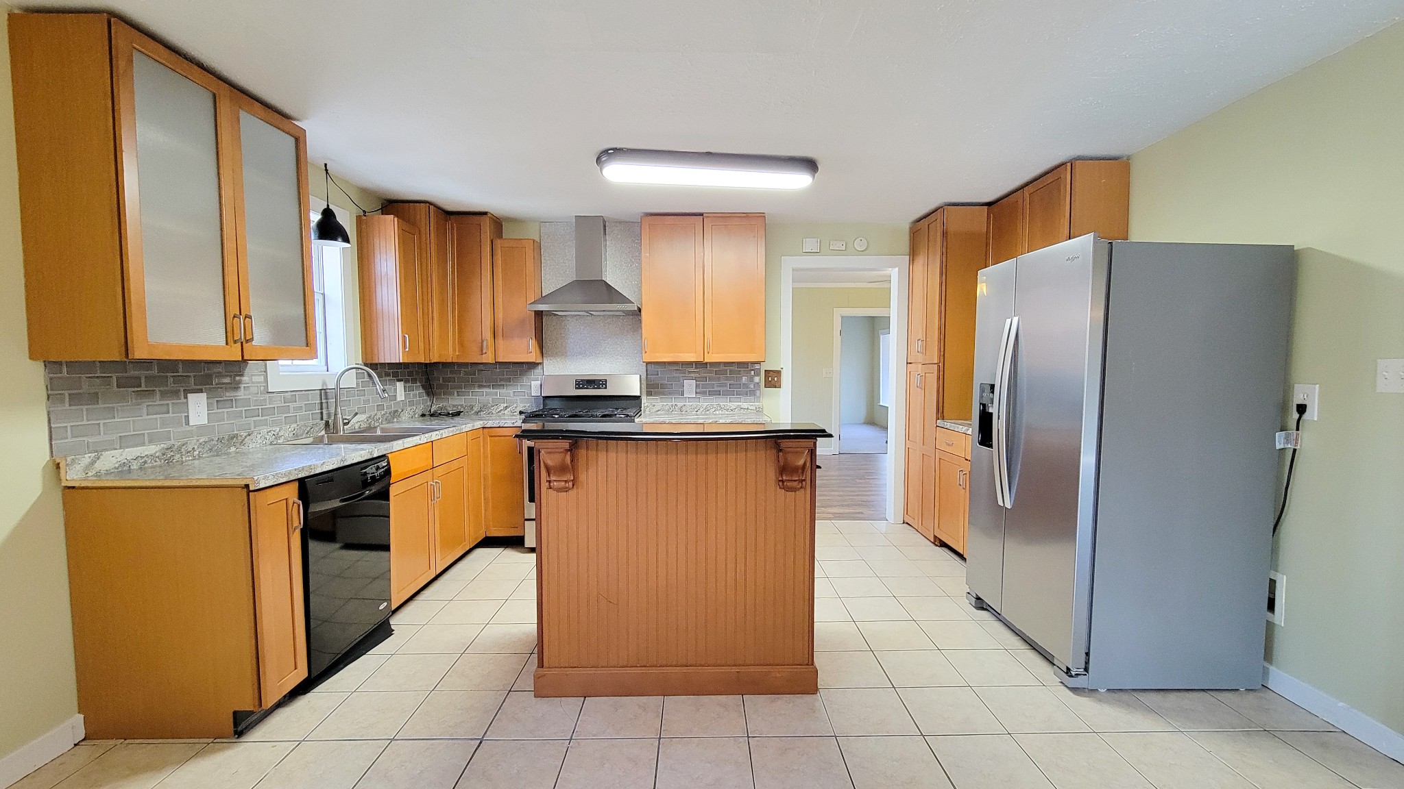 1678 4 Seasons Road Smithville, TN 37166 - Photo 26 of 43 a kitchen with stainless steel appliances granite countertop a refrigerator a stove and a sink