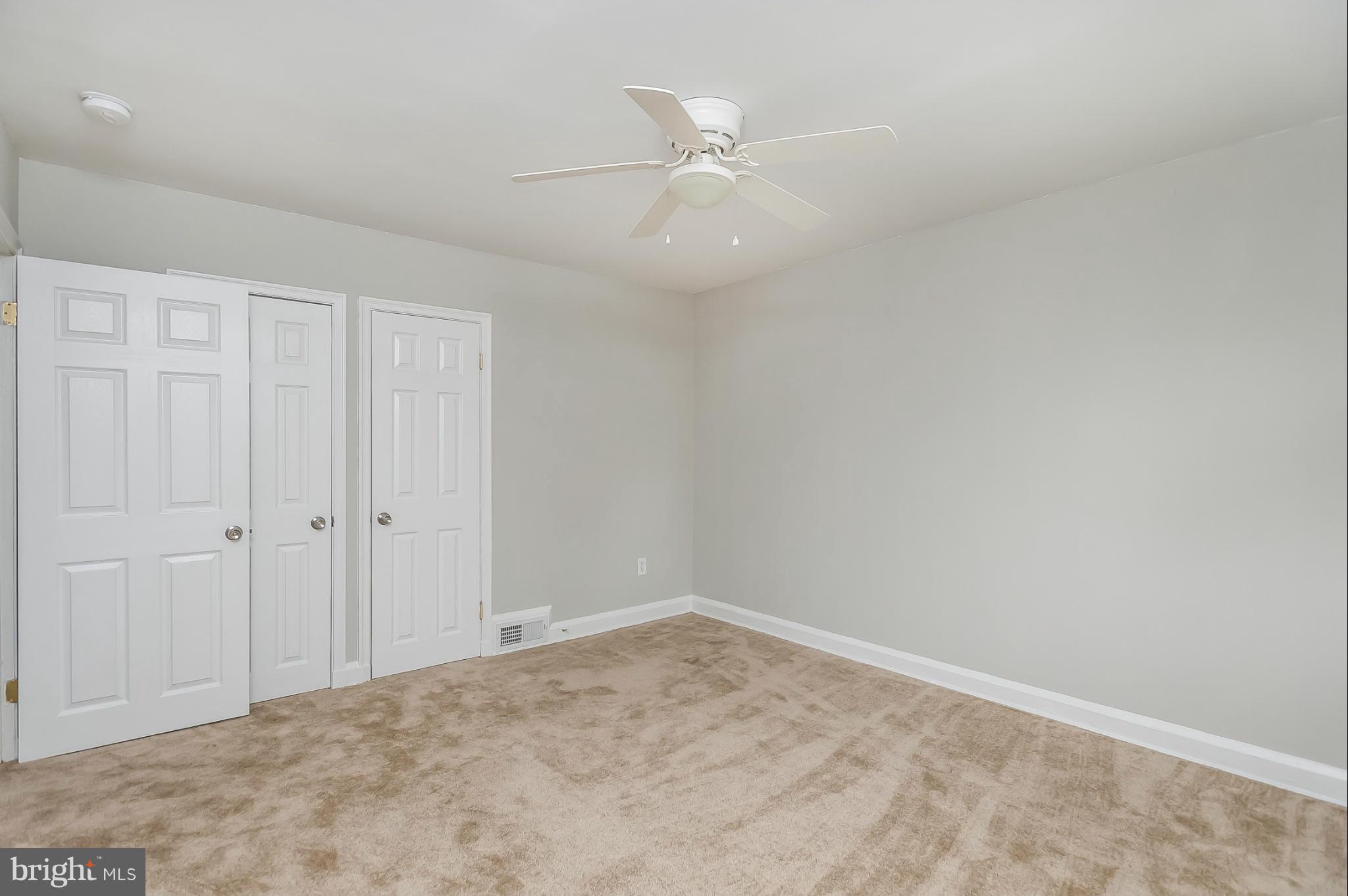 1382 Pentwood Road Baltimore, MD 21239 - Photo 14 of 30 wooden floor in an empty room