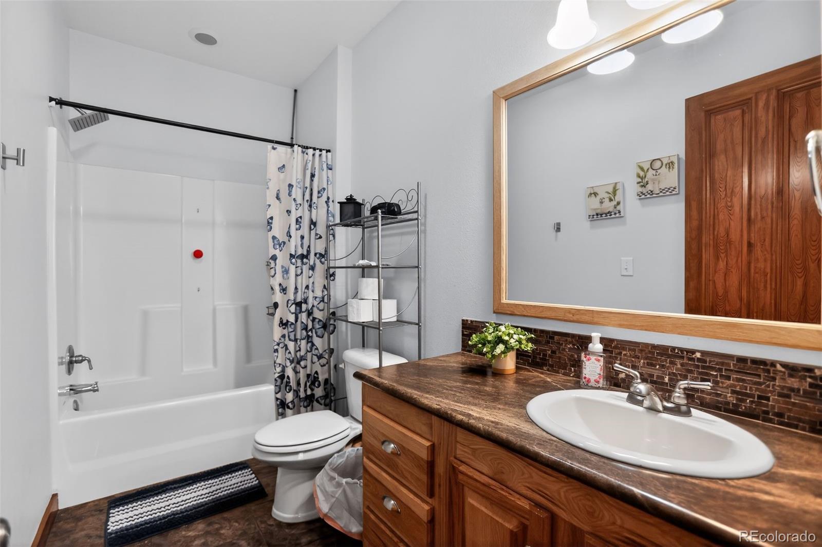 10 Salmon Loop Gypsum, CO 81637 - Photo 14 of 15 a bathroom with a sink a toilet and shower