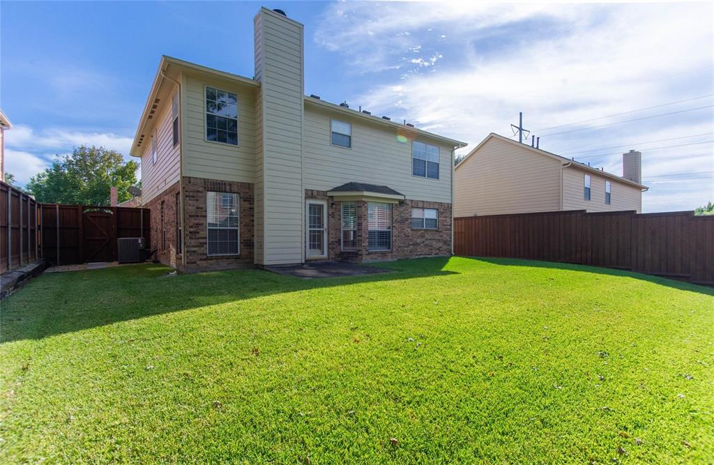 4117 Oxlea Drive Plano, TX 75024 - Photo 17 of 17 a view of a house with a backyard