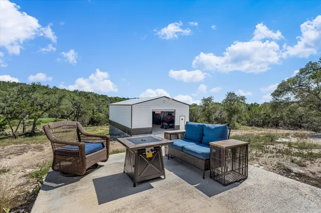 a view of a terrace with furniture