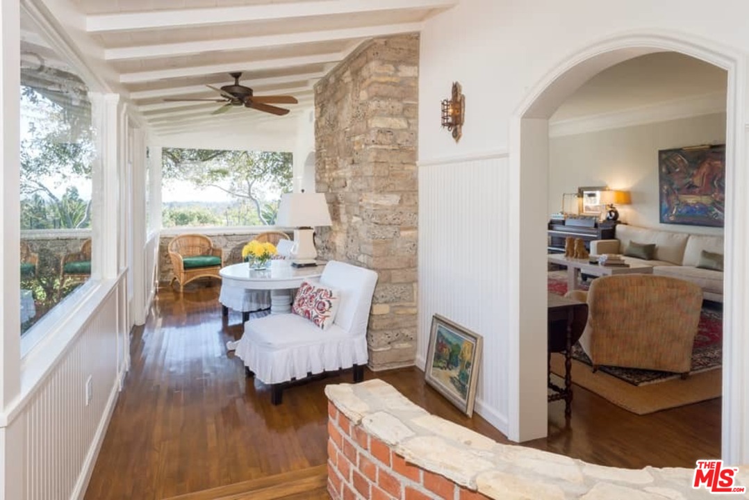1766 Westridge Road Los Angeles, CA 90049 - Photo 29 of 54 a living room with furniture and a window