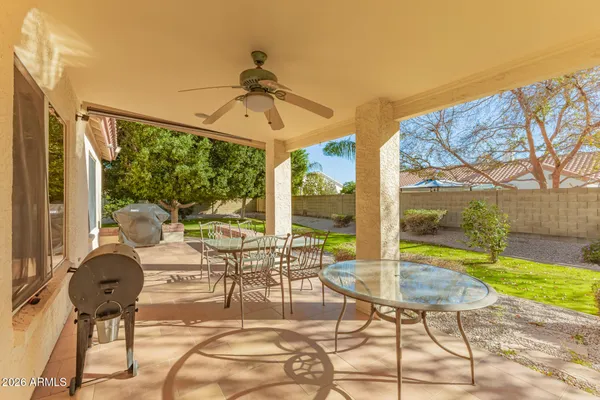 a view of backyard with green space