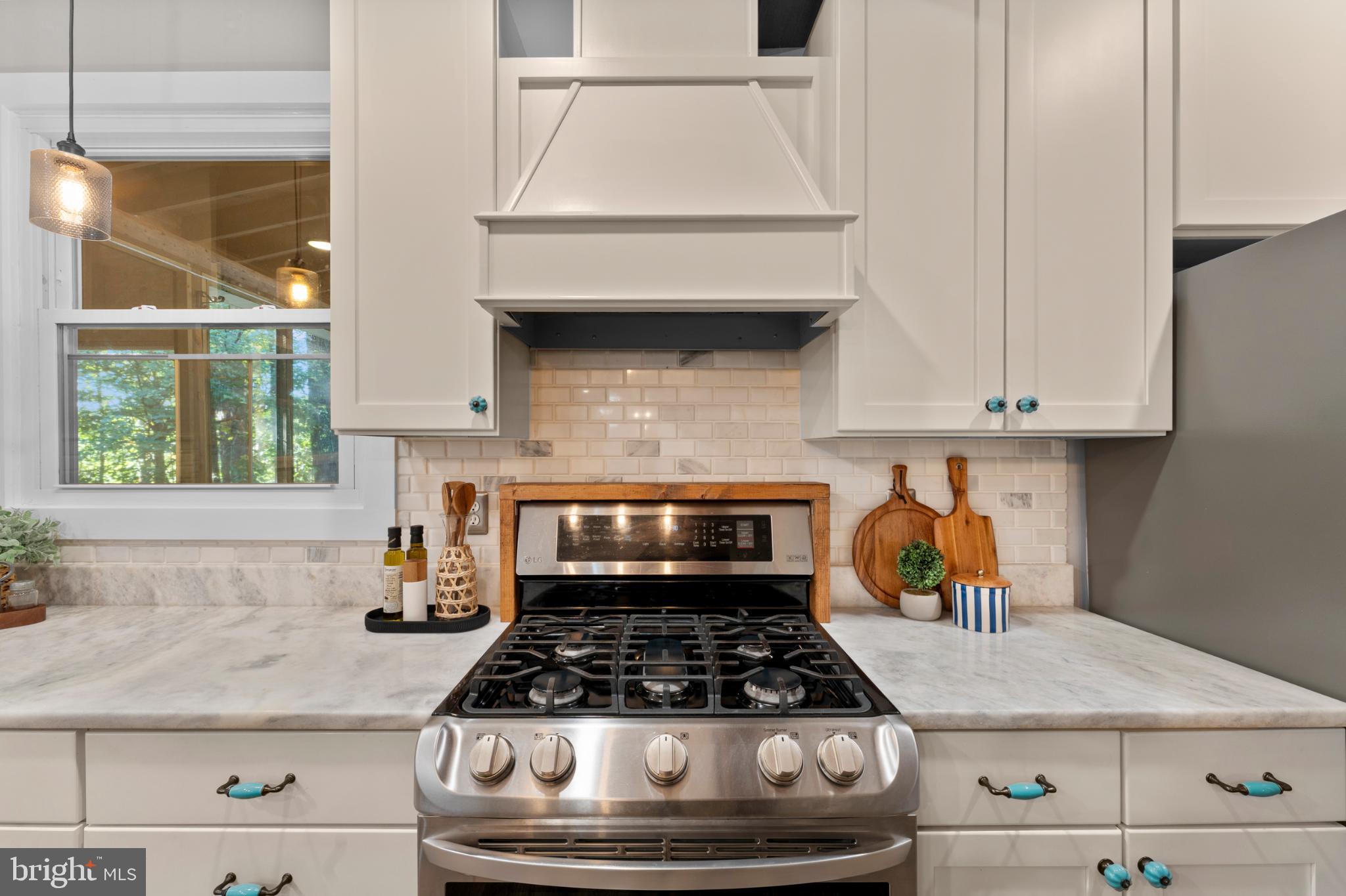 8572 Monumental Mills Road Rixeyville, VA 22737 - Photo 13 of 70 Modern kitchen with sleek finishes.