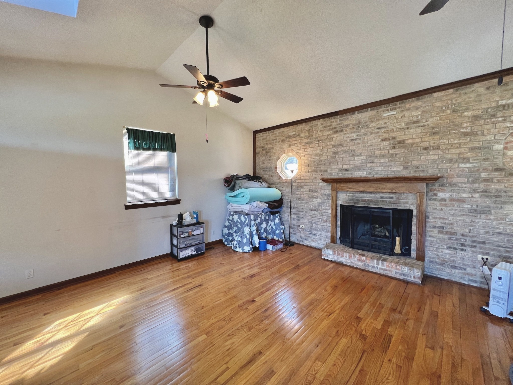 506 New Center Church Road Shelbyville, TN 37160 - Photo 14 of 44 a room with fireplace and wooden floor