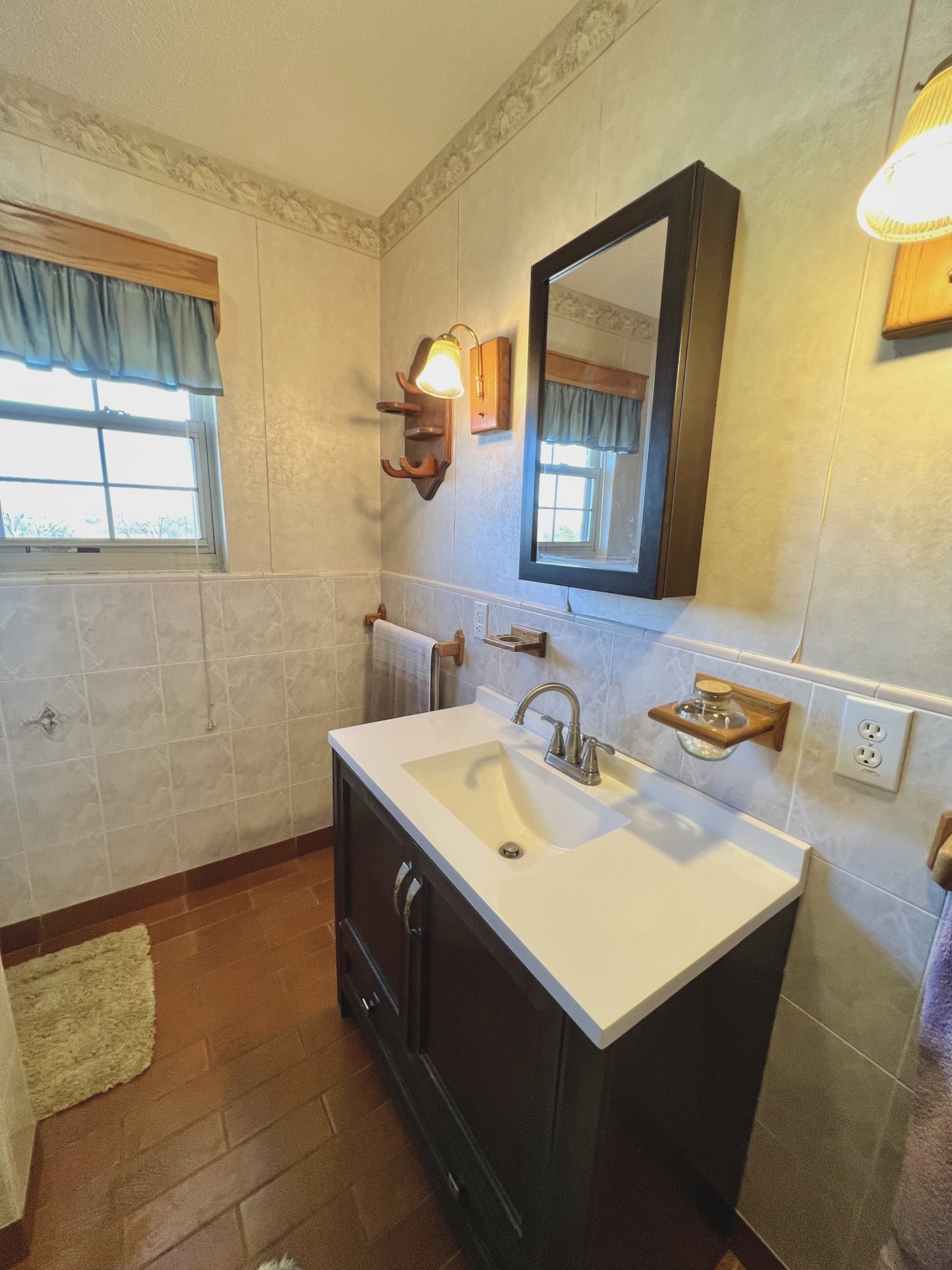 506 New Center Church Road Shelbyville, TN 37160 - Photo 29 of 44 a bathroom with a sink and a mirror