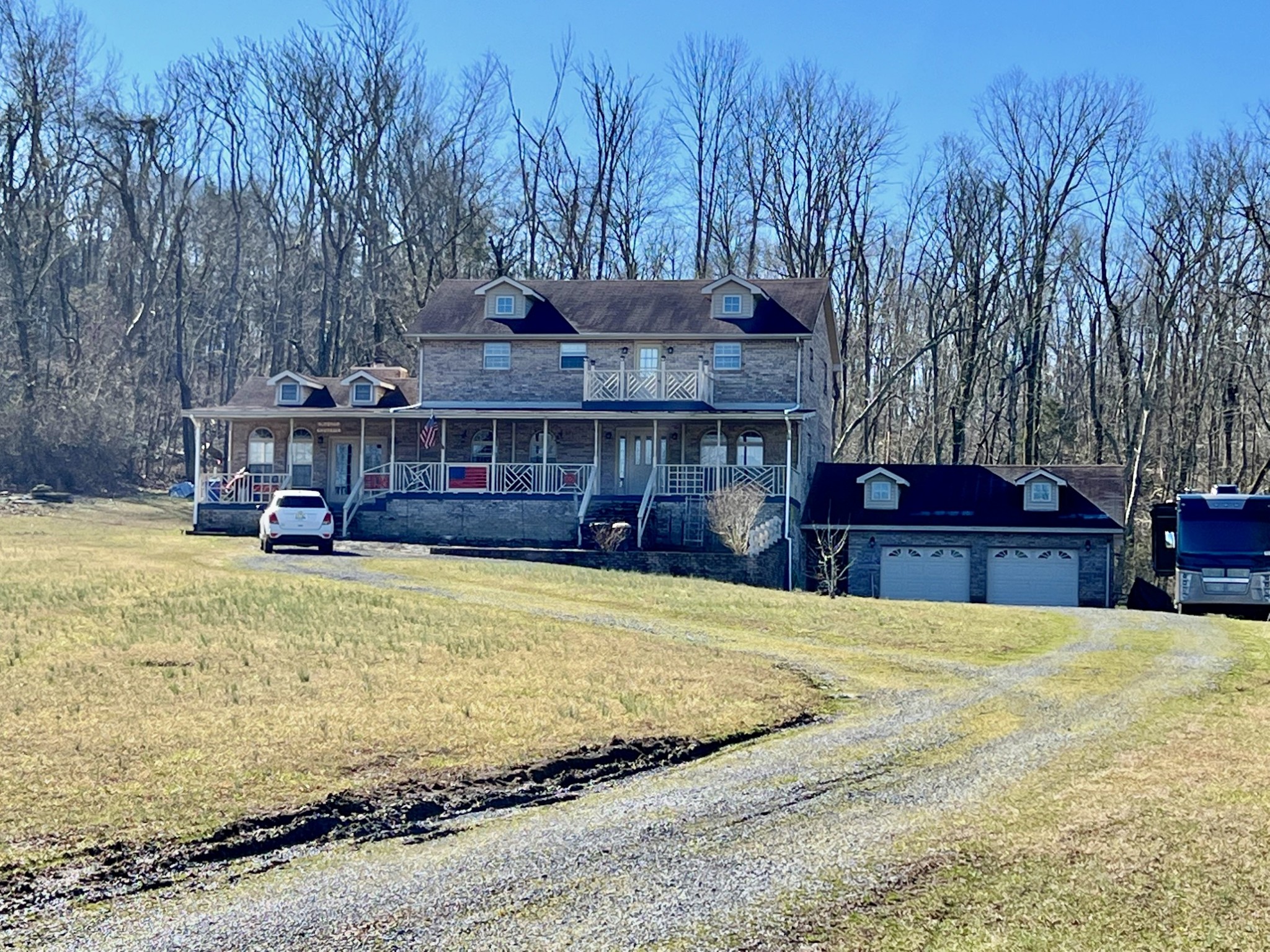 506 New Center Church Road Shelbyville, TN 37160 - Photo 4 of 44 a view of a house with a yard and sitting area