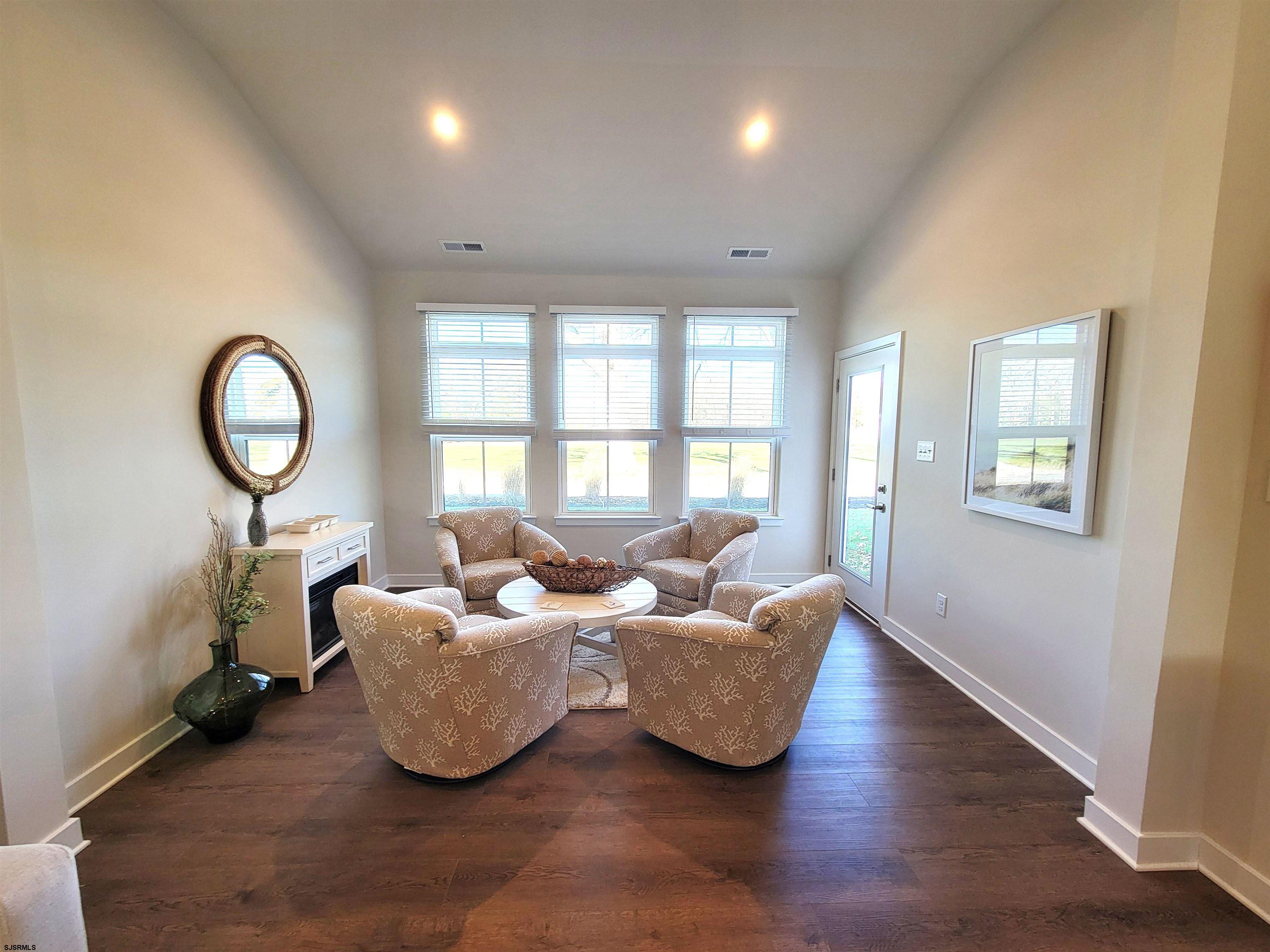 1004 Jesse Drive Somers Point, NJ 08244 - Photo 13 of 45 a living room with furniture and a large window