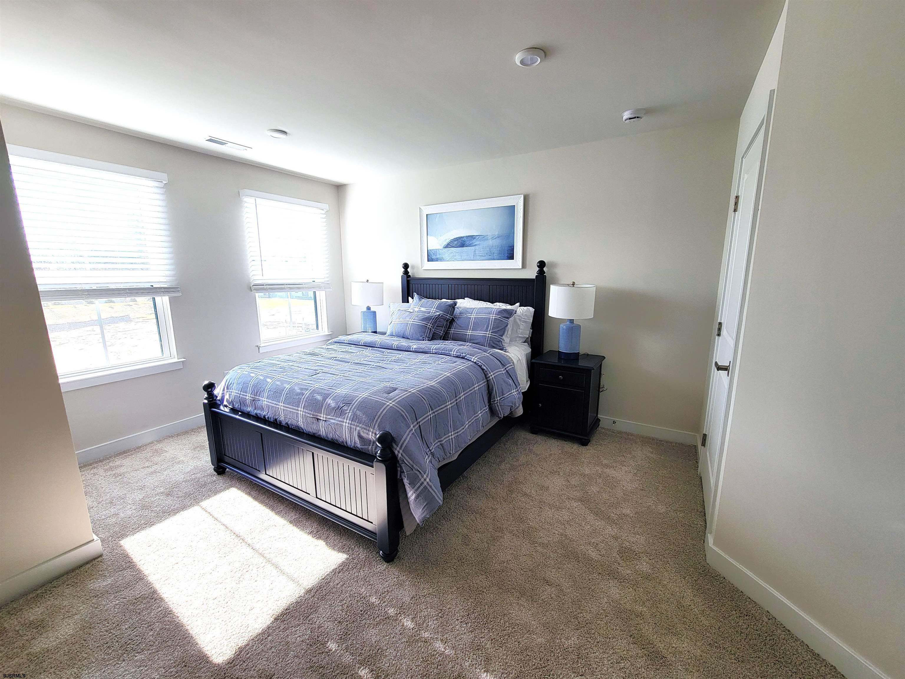 1004 Jesse Drive Somers Point, NJ 08244 - Photo 34 of 45 a bedroom with a bed and window