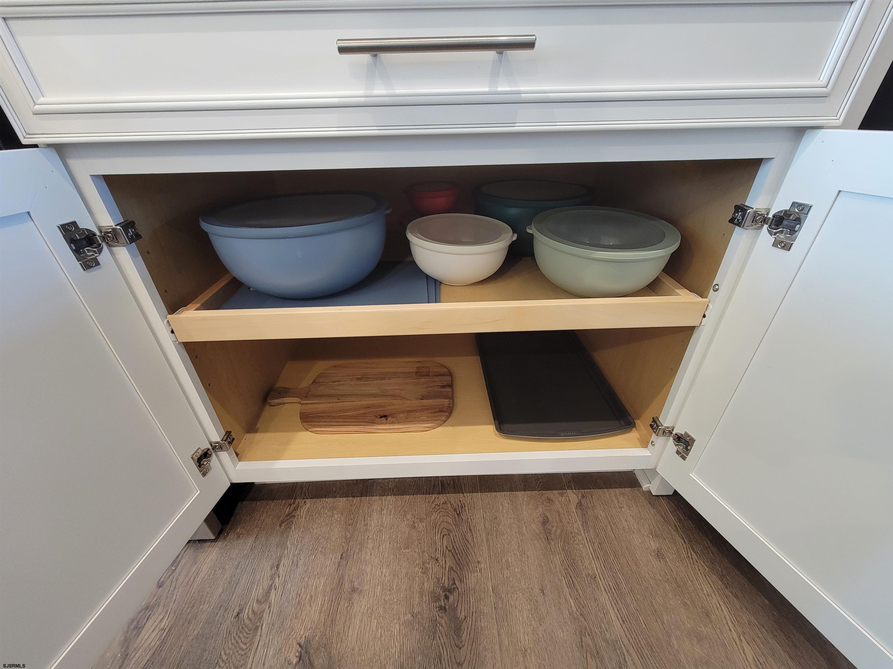 1004 Jesse Drive Somers Point, NJ 08244 - Photo 42 of 45 a shelf with a glass door