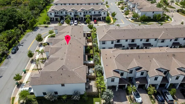 aerial view of a house with a swimming pool